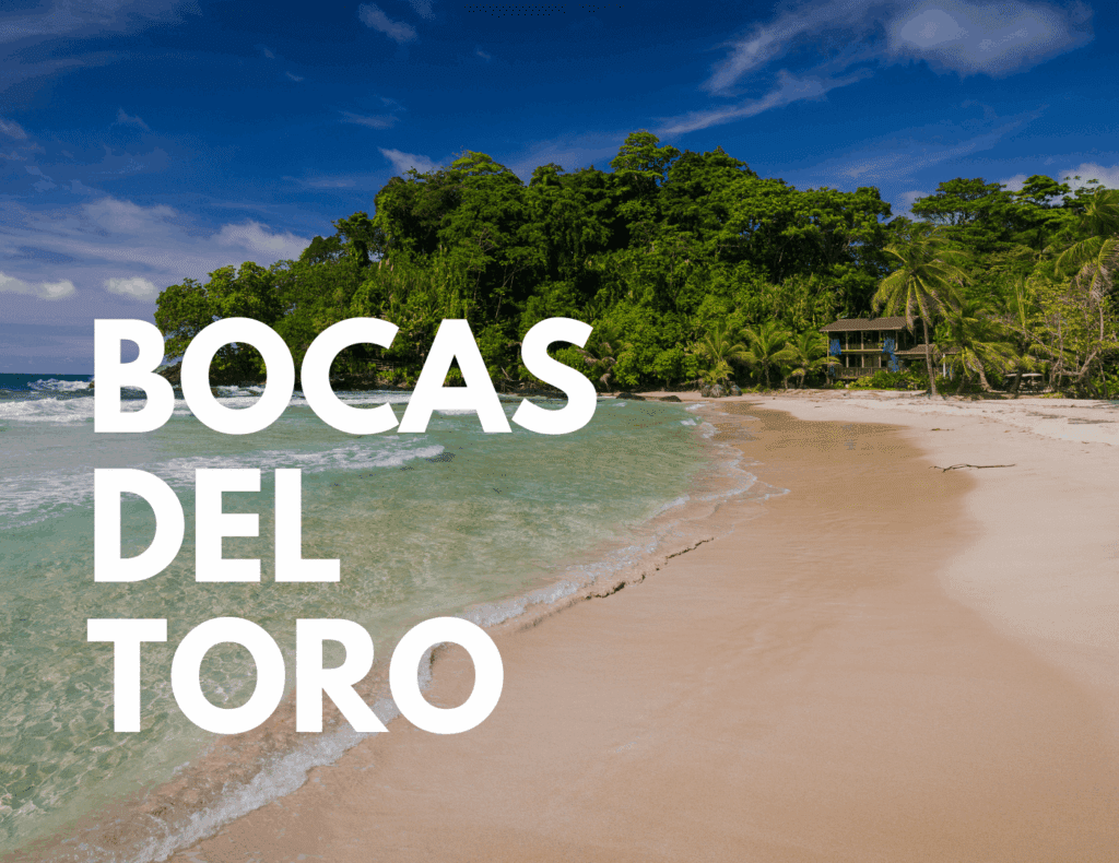 Tropical beach in Bocas del Toro with turquoise water and jungle backdrop — showcasing island living in Panama.
