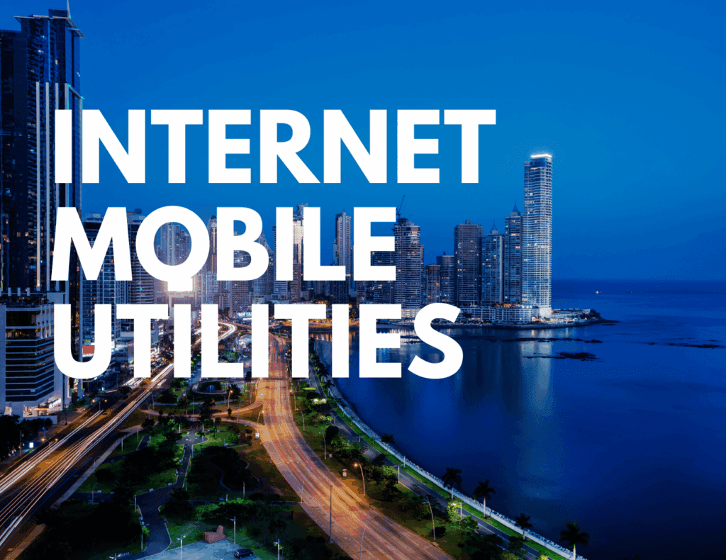 Night skyline of Panama City with lit-up roads and towers — representing utility costs like internet, mobile, and electricity.