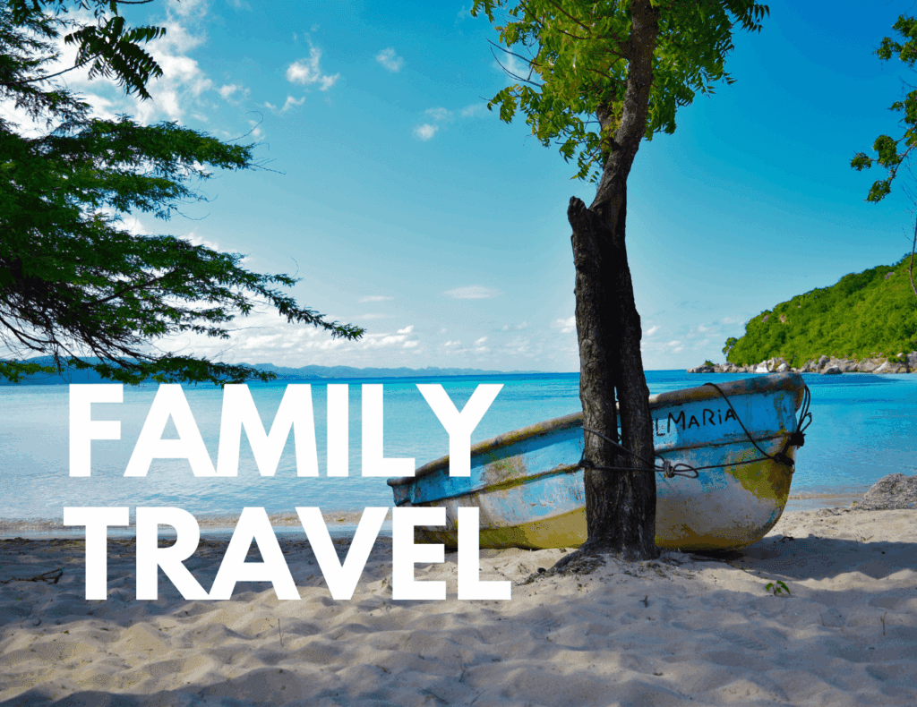 Beached boat on tropical shore representing family travel life in Costa Rica