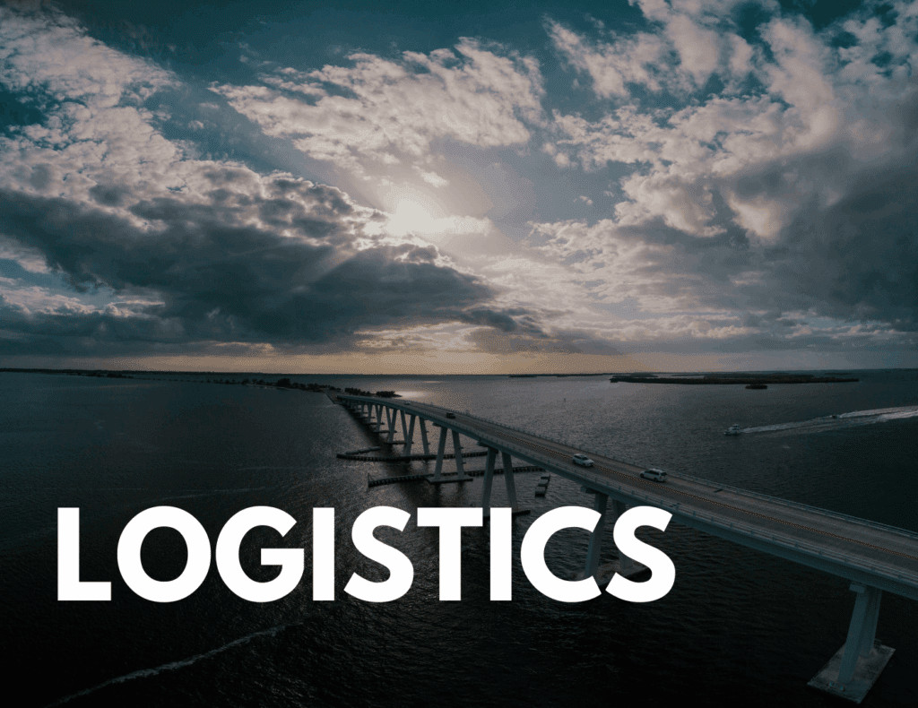 Bridge over open water under cloudy skies — represents handling logistics like visas, insurance, and housing.