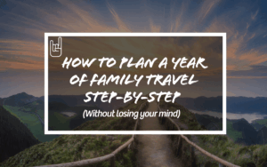 Scenic mountain trail with sunrise — cover image for blog post on how to plan a year of family travel step-by-step.